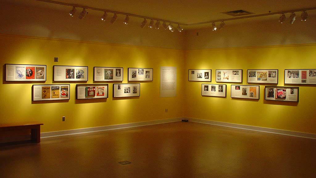 Additional photos of calypso hung on the yellow walls