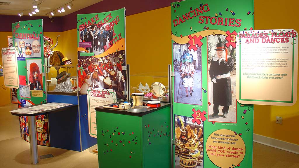 an array of large posters related to carnival festivities