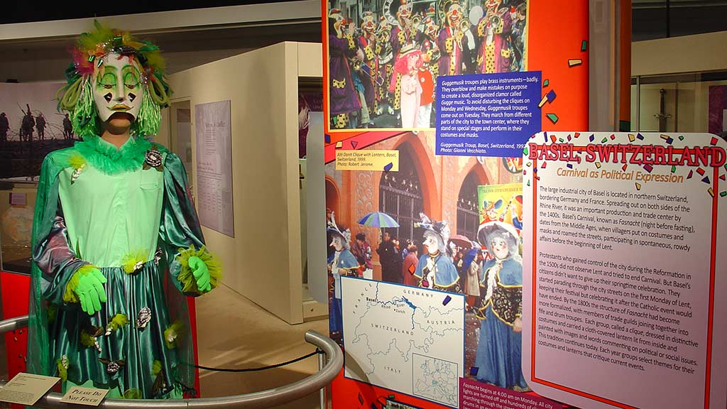 green clown costume shot with associated text panel
