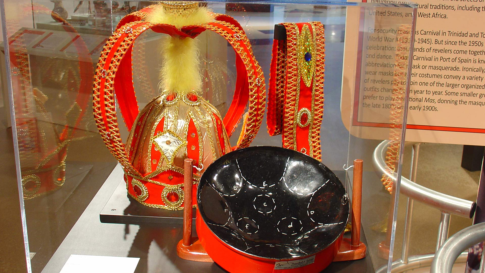 red and gold crown made of feather and fabric