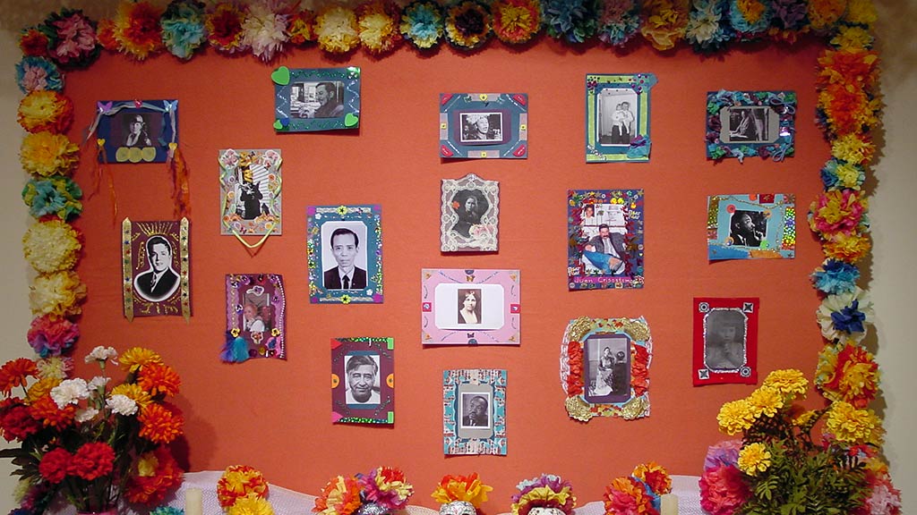 closeup of photo wall, flowers around