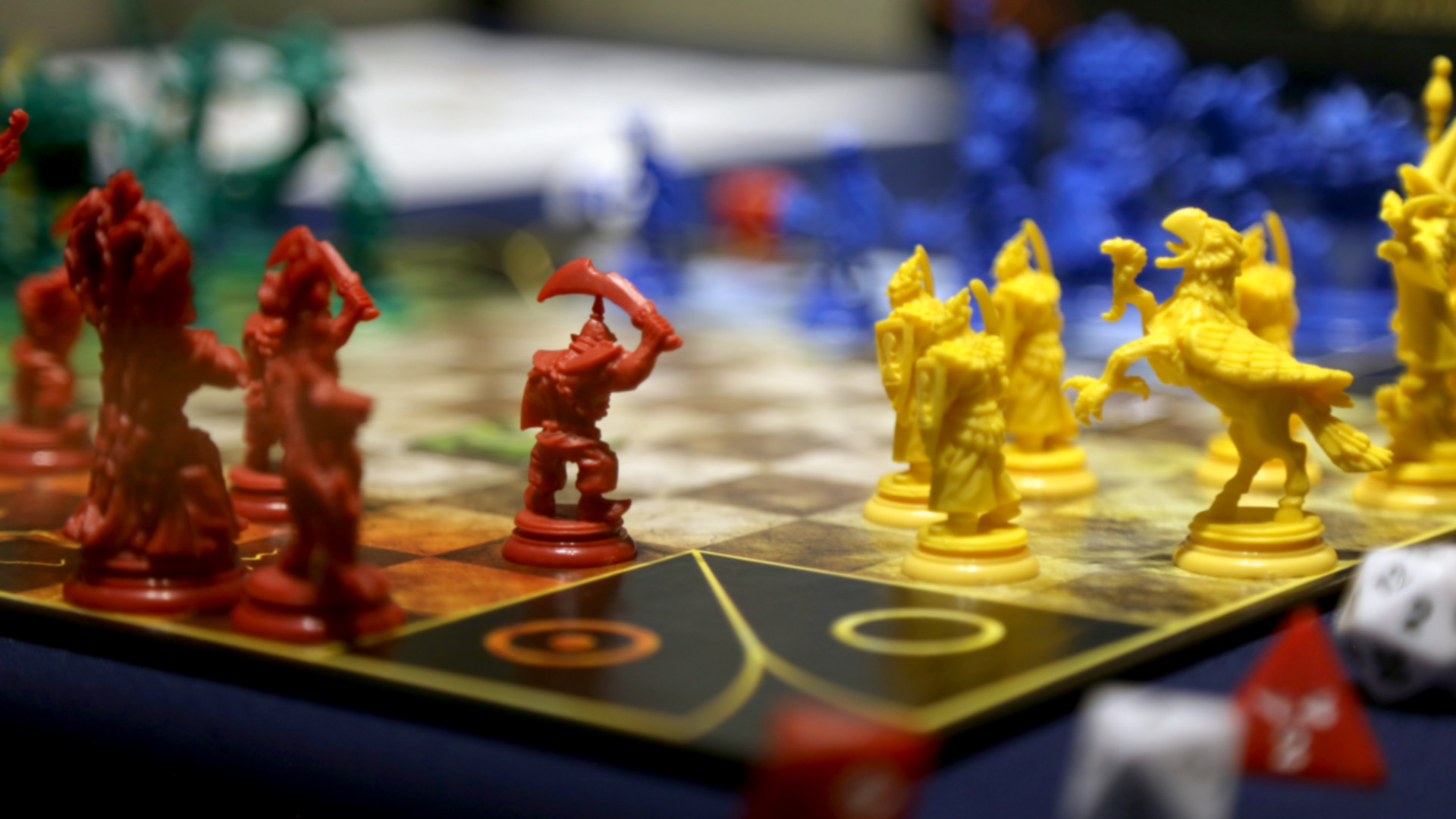 closeup shot of red, yellow, blue and green figures from the 'loka' game