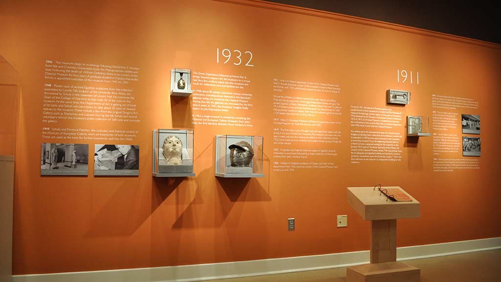 artifacts arranges on the wall by the progression of time starting at 1911
