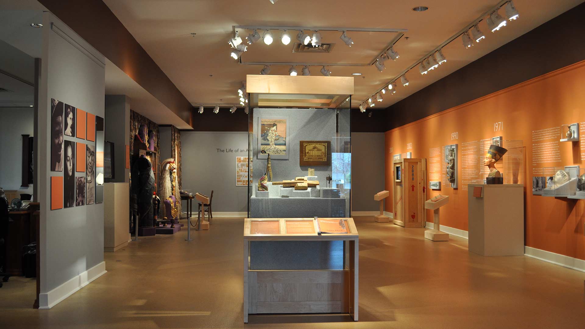 gallery view of part of the exhibit showing the display cases and artifacts