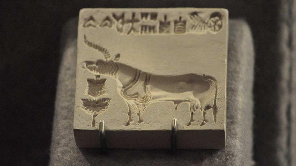 a carving of an animal in white stone