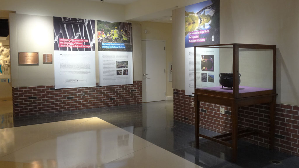 right side exhibit overview, a cooking iron pot in the plexiglass
