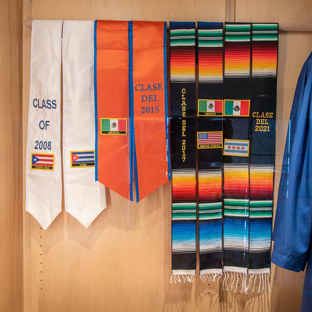 three Latinx graduation stoles