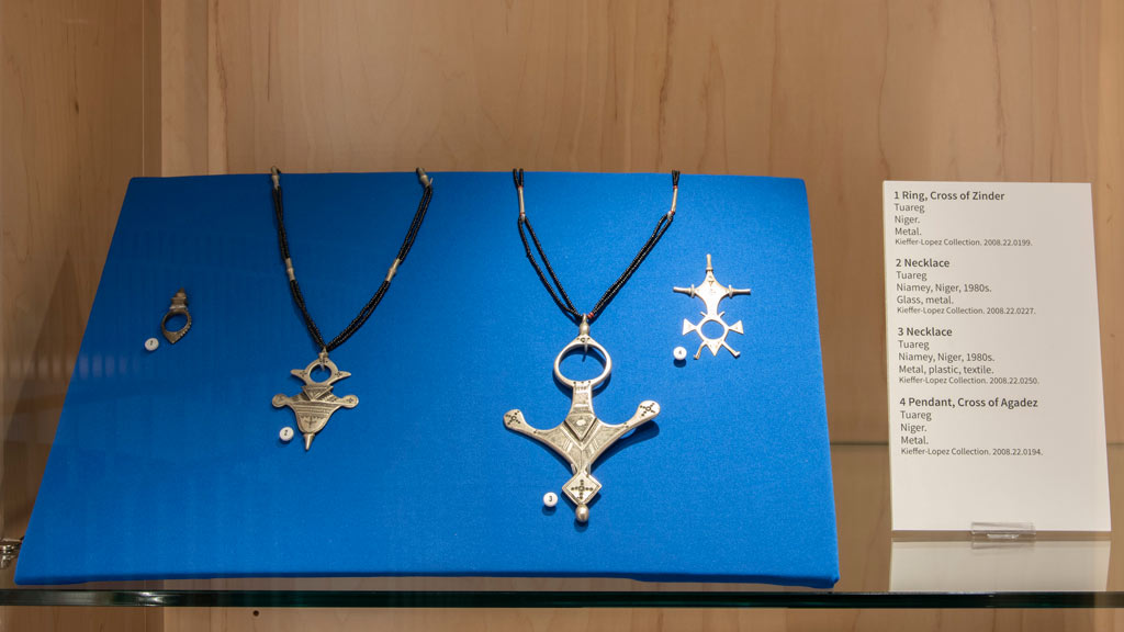 A close-up of various tuareg necklaces=