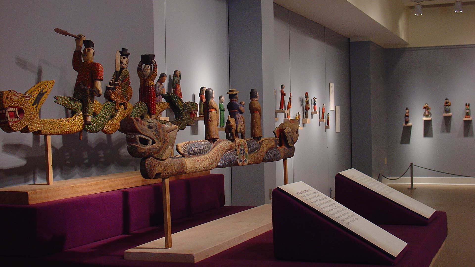 many figures on a dragon boat