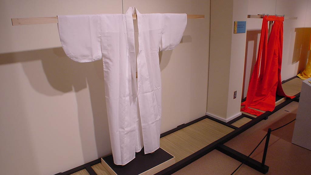 white and red kimonos from an angle