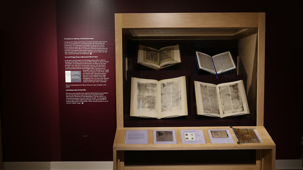 exhibit case with 4 books