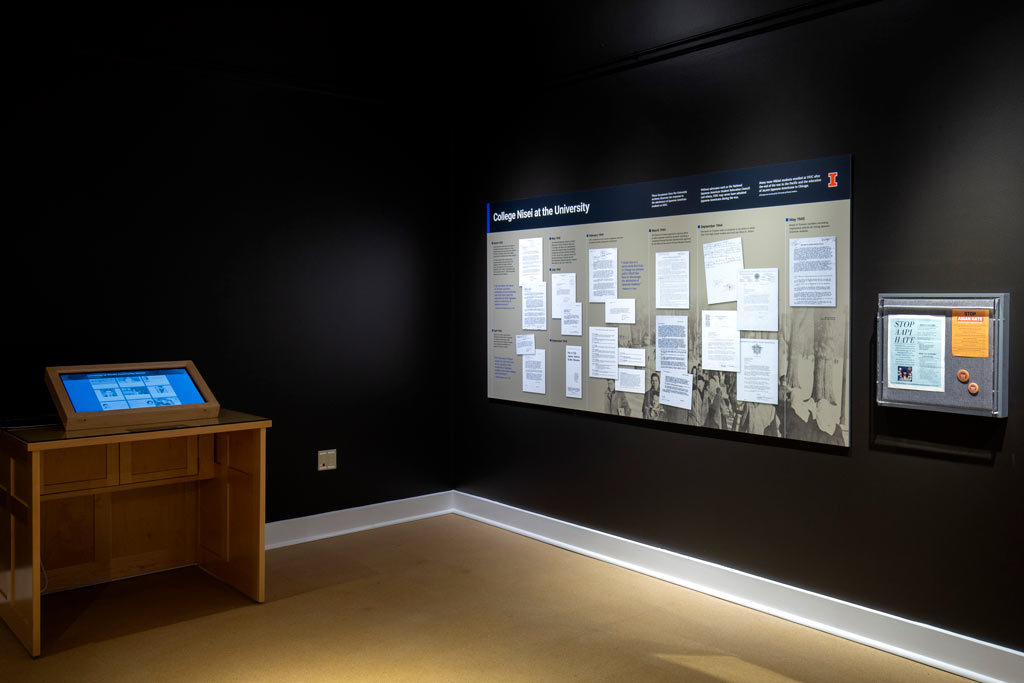 corner of the gallery with an interactive display and board discussing the japanese experience at Illinois