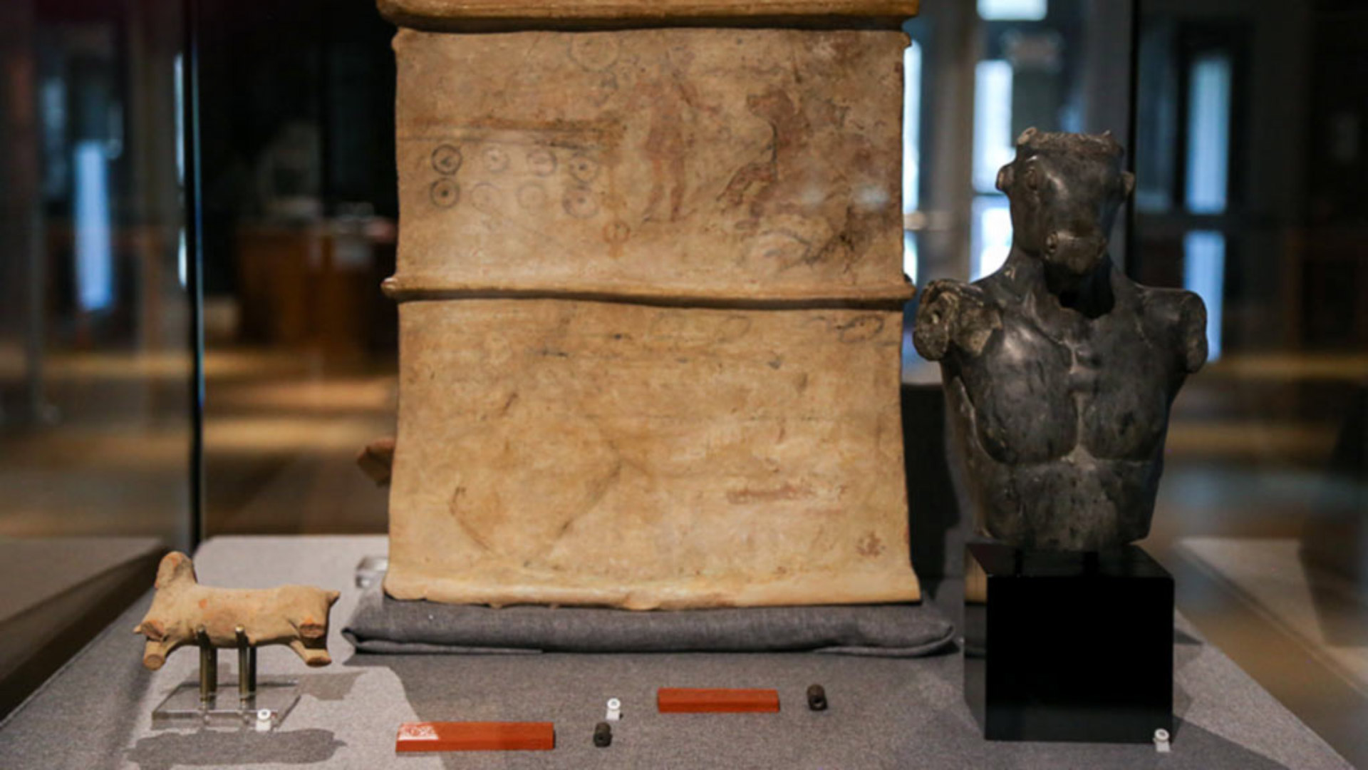 Display case containing artifacts related to the transformation portion of the exhibit