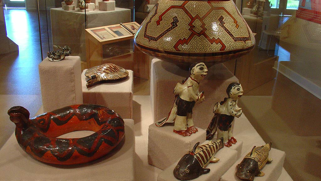 ceramic artifacts: snakes, people, fishes, sea animals