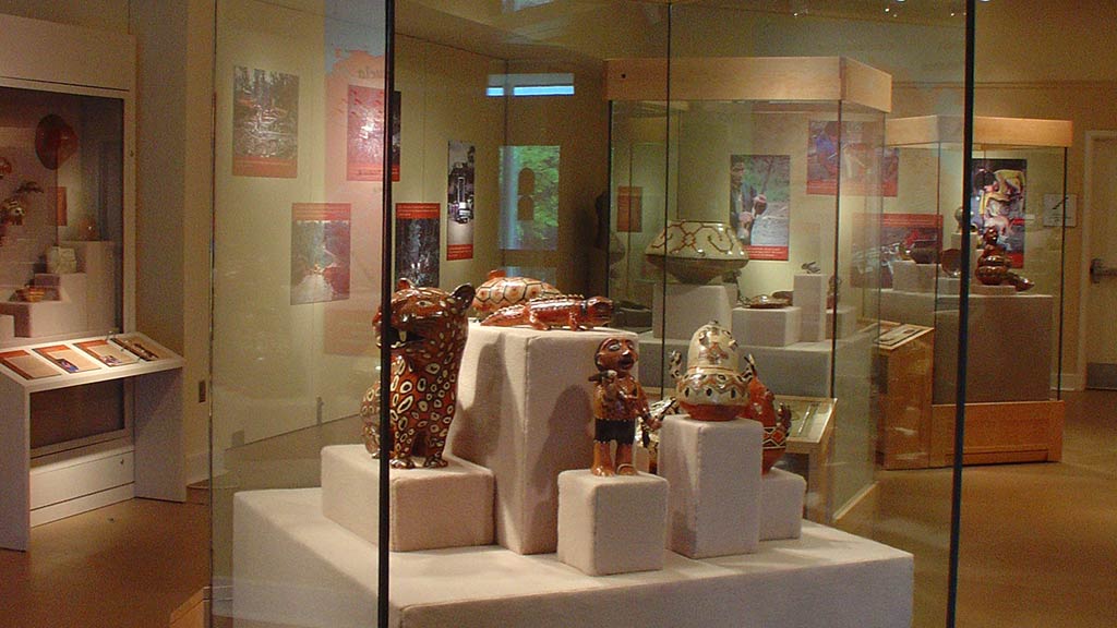 ceramic sculpture of animals in the display case
