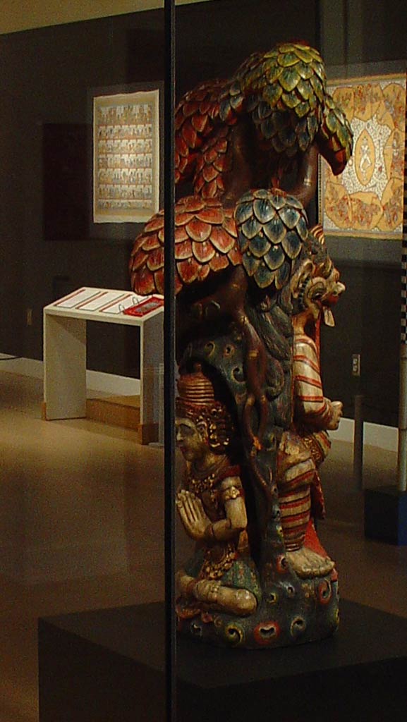 sculpture composed of mounts and god, red, blur and green