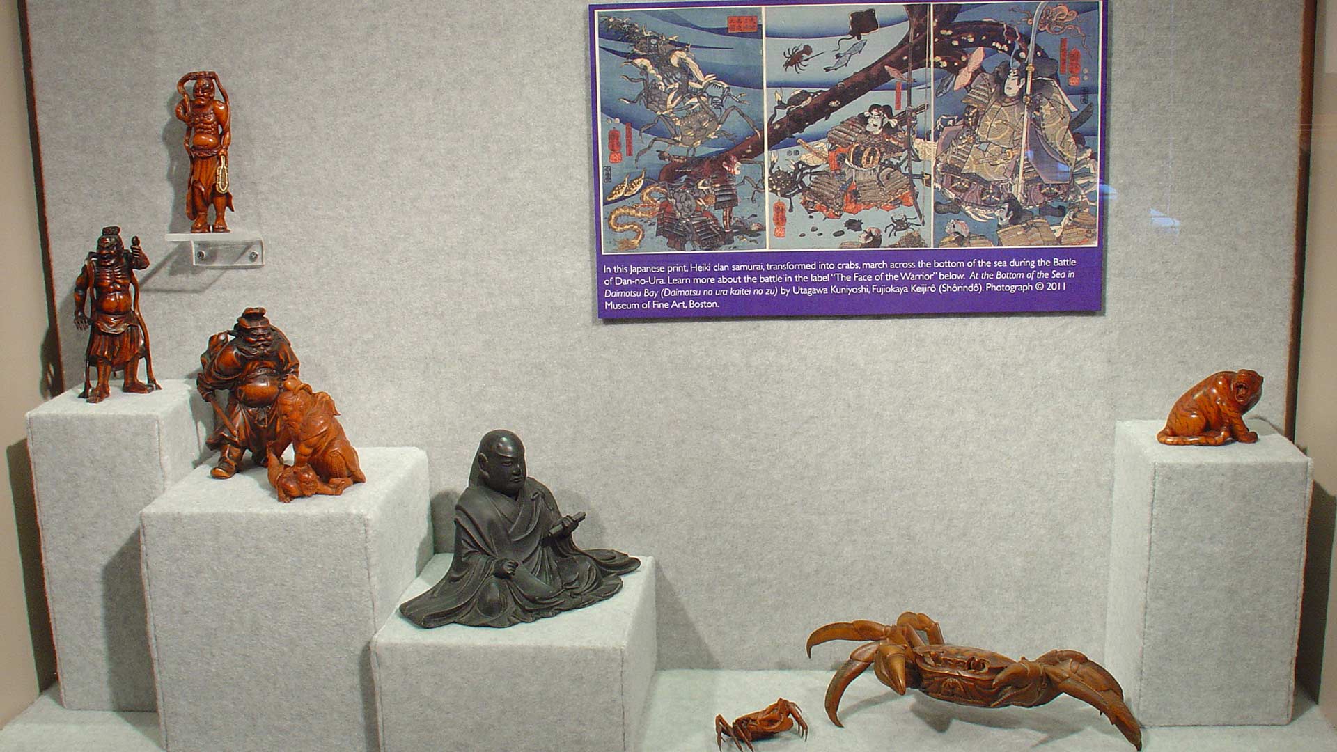 sculptures of warriors, god and demons